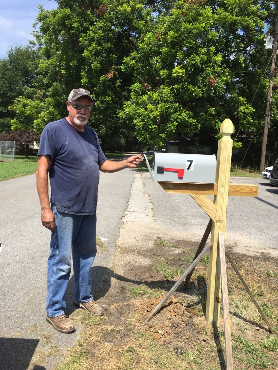 A Burnsville city employee helps out with our makeshift mailbox.