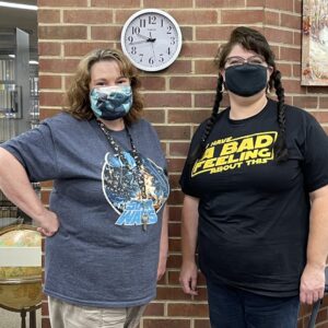 Teresa and Dee in their Star Wars tees at the Corinth Library.