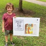 Jeremiah Thomas Jefcoat visited Belmont Library's StoryWalk!  Thank you Jeremiah!