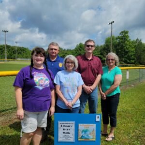 Tishomingo StoryWalk with NERL Director, Dee hare, Police Chief Mike Kemp, Librarian Beverly Parker, Mayor James Tennyson, and Town Council Member Anne Taylor