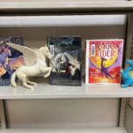 The Belmont Library show cases new juvenile fantasy books with props