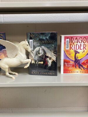 The Belmont Library show cases new juvenile fantasy books with props