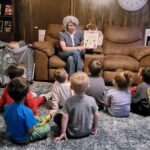 Beverly reading to a local daycare.