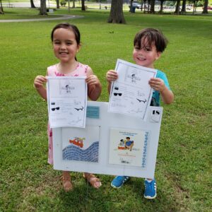 Mia and Steele, participating in our Story Walk & Scavenger Hunt.