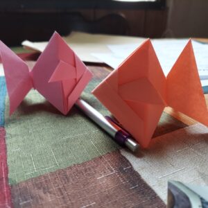 Tishomingo patron Kayden with his craft projects from packet one