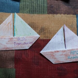 Tishomingo patron Kayden with his craft projects from packet one