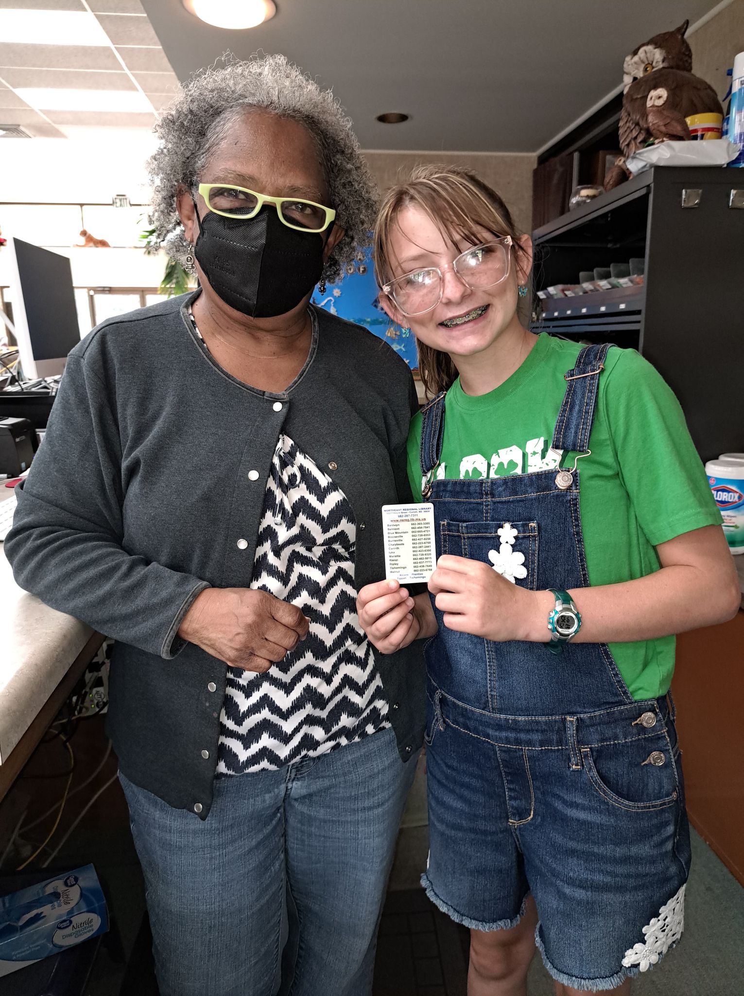 Mariah Waldon, as she receives SRP prizes and her own very first library card!