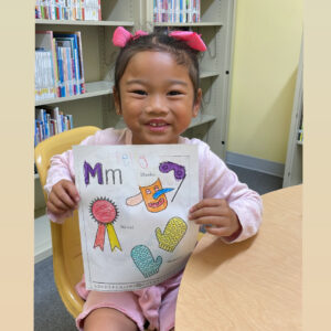 Bella loves coming to the Tishomingo library!