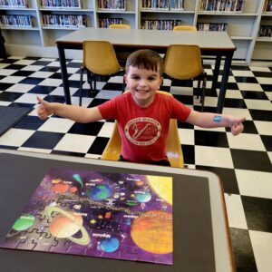 “It’s all thumbs up for this little guy” at the Tishomingo Library!