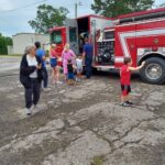 Maryland William, Belmont Fire Chief, talked to the children about fire safety. He brought the fire truck and allowed the children to walk through it. June 13, 2023. at Belmont Library Summer Reading Program 🌞 All Together Now!